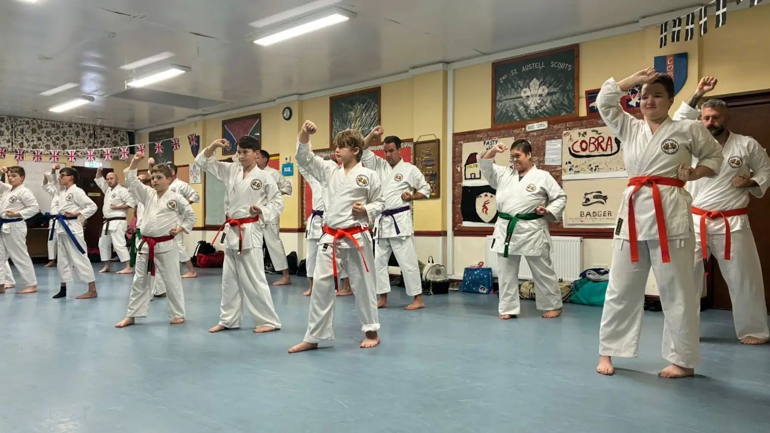 Students training in an open karate family class